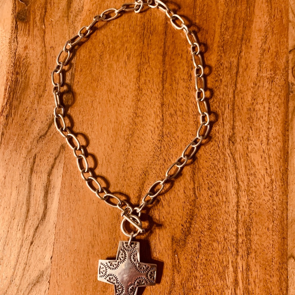 Silpada silver cross pendant.It measures 1 1/2 by the 1/2 inches.